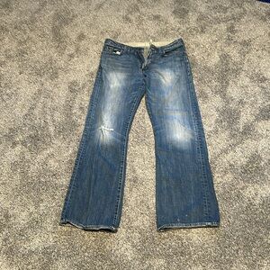 Relaxed ripped blue jeans 34x34